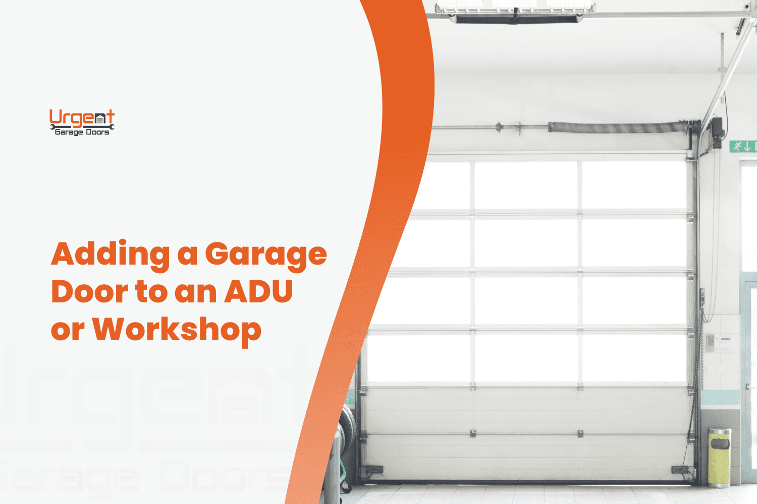 White sectional garage door with windows installed in a bright ADU workshop space
