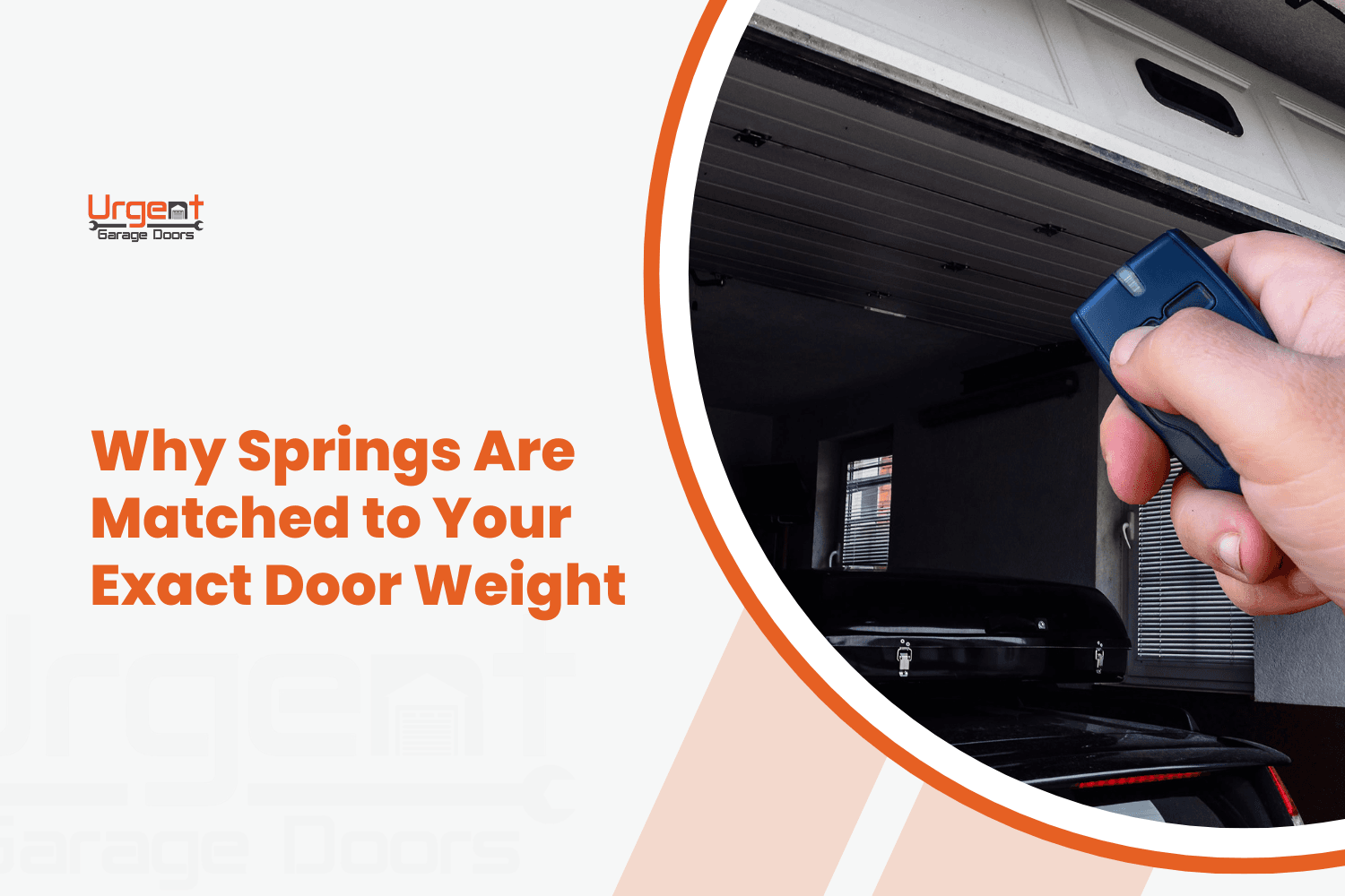Hand holding blue garage door remote opener while opening a garage door